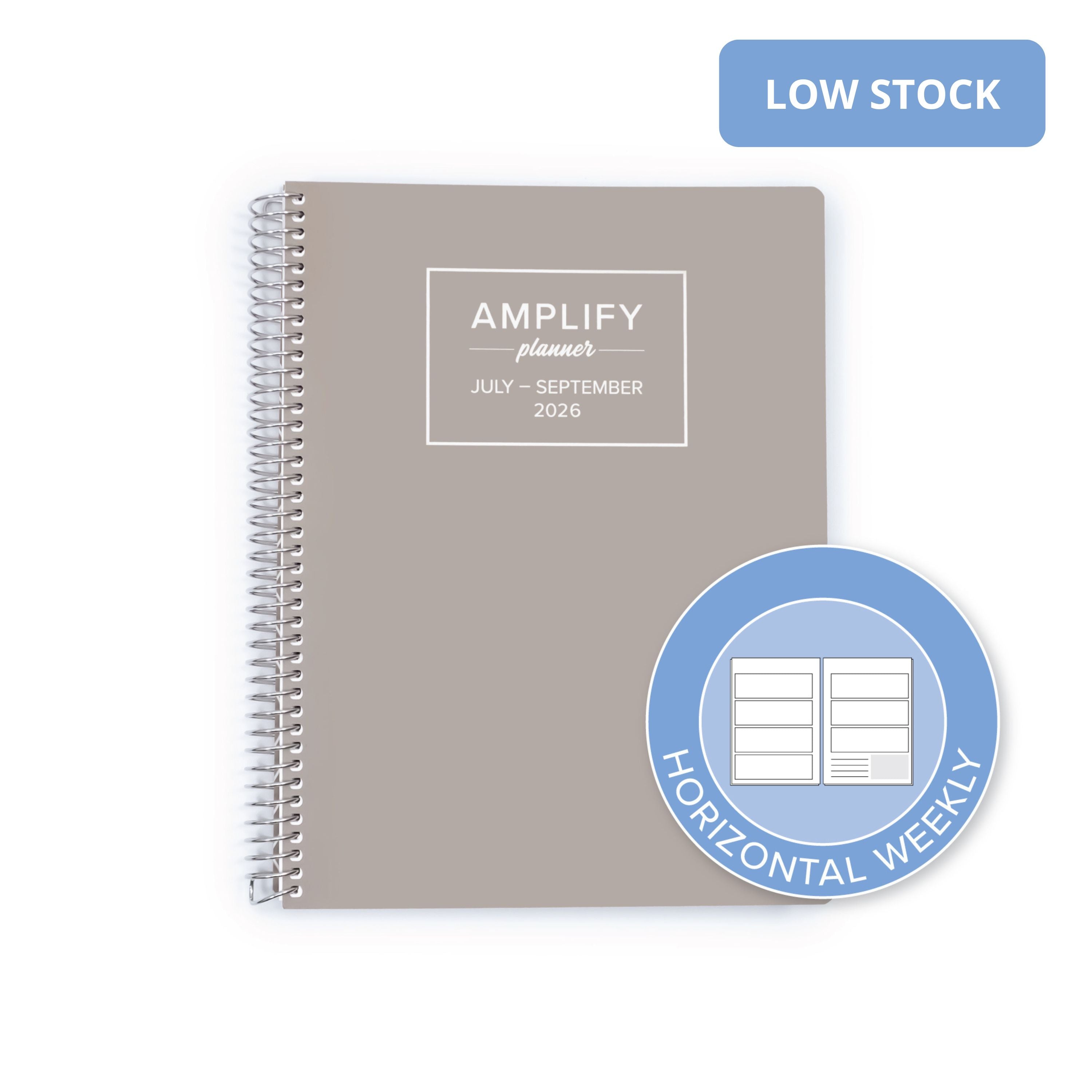 A spiral-bound planner shown on a white background with a blue 'LOW STOCK' label in the top right and a circular badge reading 'HORIZONTAL WEEKLY' in the bottom right. The planner cover is taupe-gray with white text and a white spiral binding.