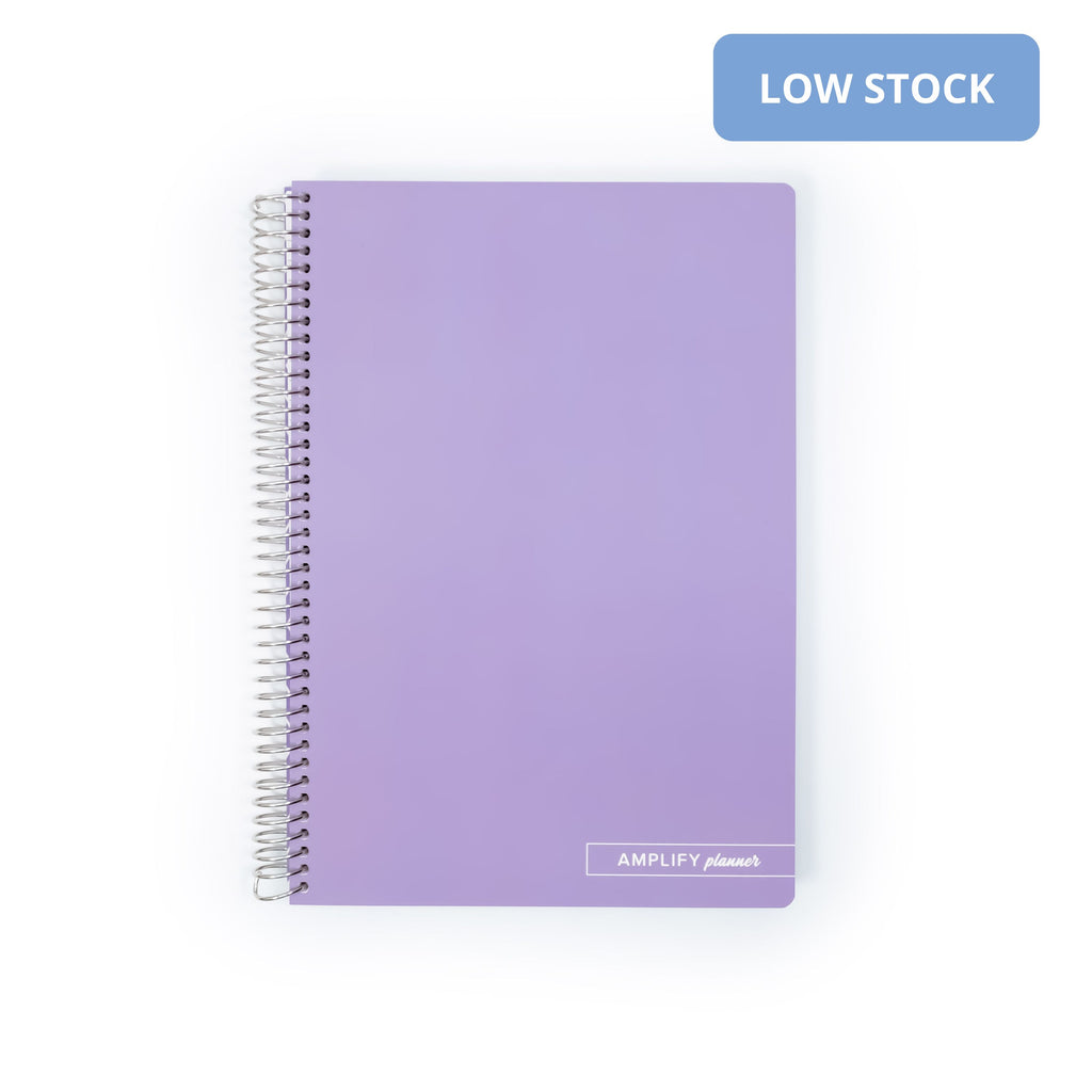 Ube Latte Spiral Notebook by Amplify Planner with a soft-touch lavender cover and spiral binding, perfect for organizing notes and ideas.