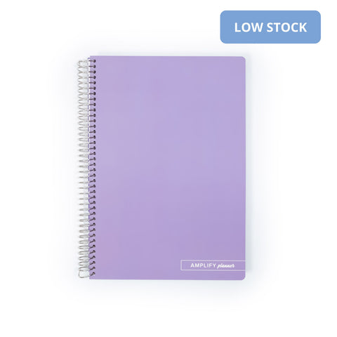 Ube Latte Spiral Notebook by Amplify Planner with a soft-touch lavender cover and spiral binding, perfect for organizing notes and ideas.