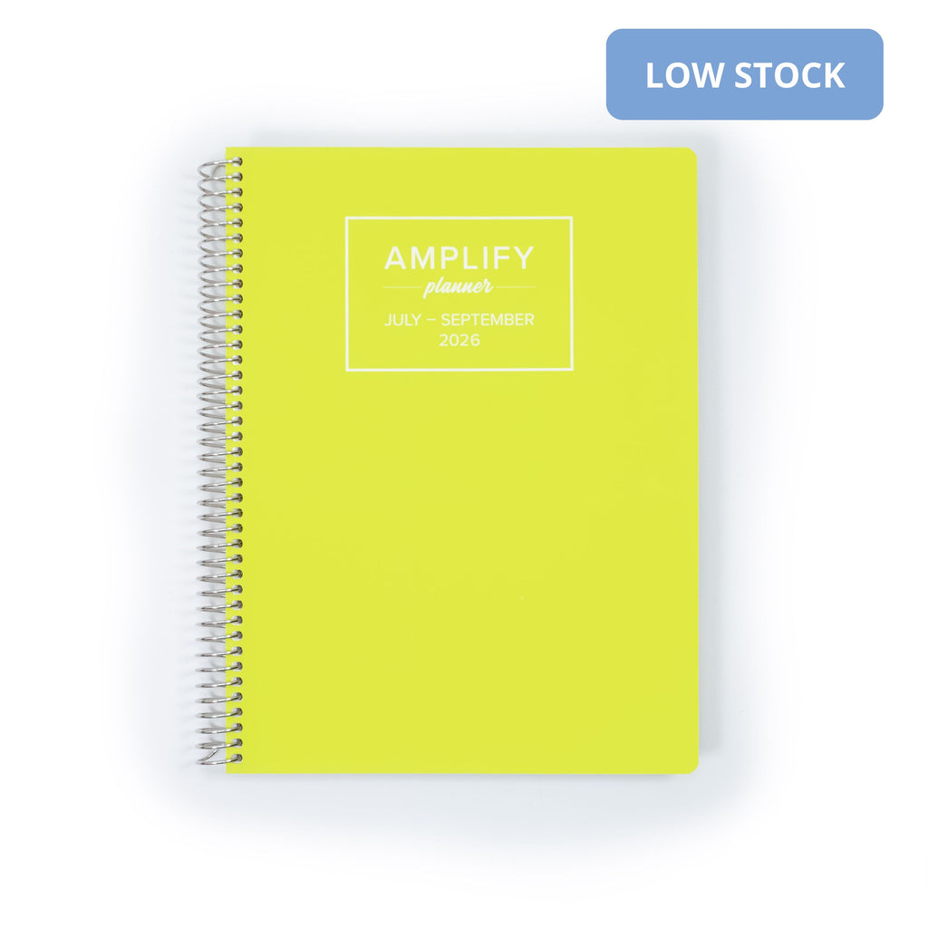 Daily Planner - July-September 2026 - Electric Yuzu by Amplify Planner, featuring a vibrant chartreuse cover with a metal spiral binding.