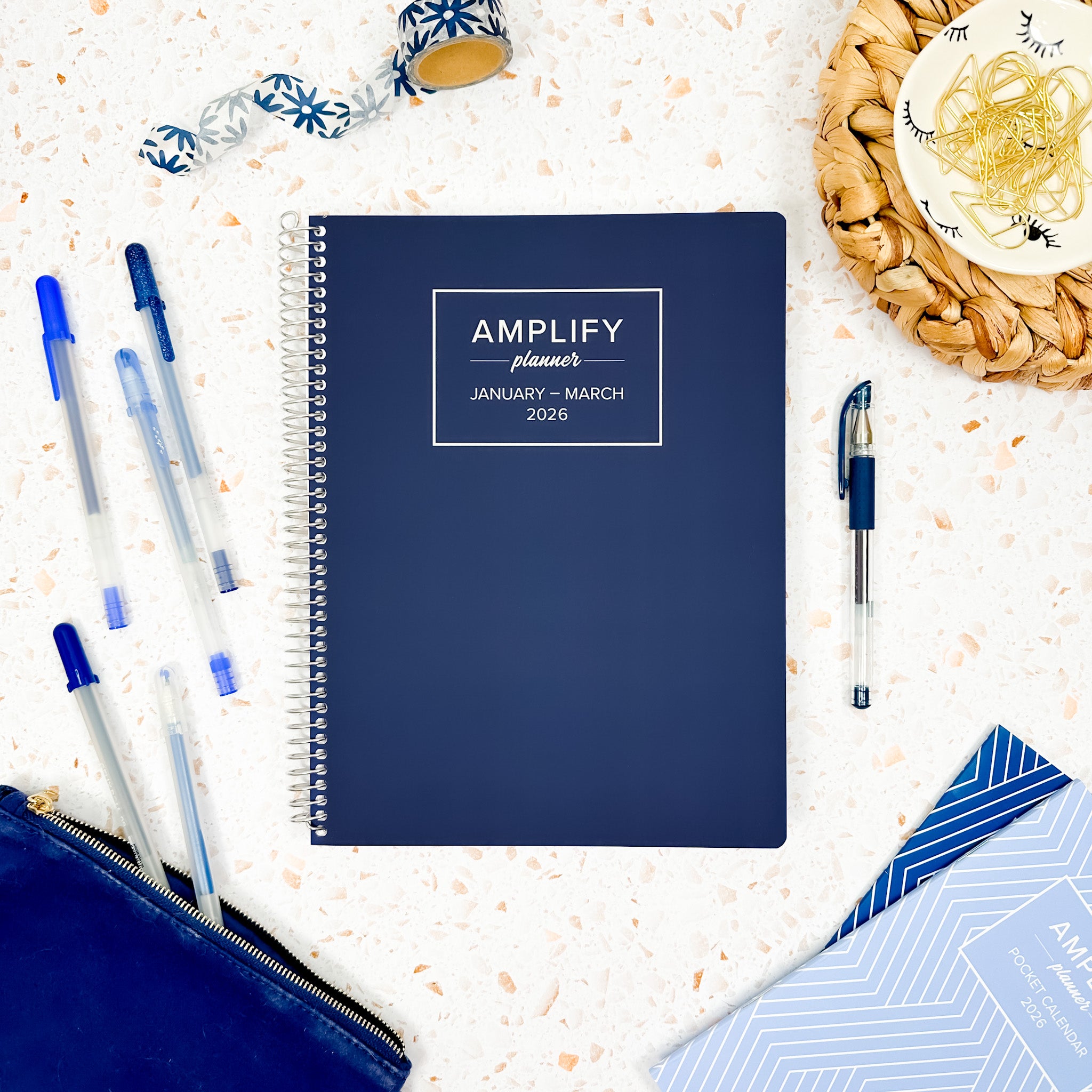 Daily Planner - January-March 2026 - Night Into Navy displayed flat with pens on a stylish desk, showcasing a practical layout for productivity.