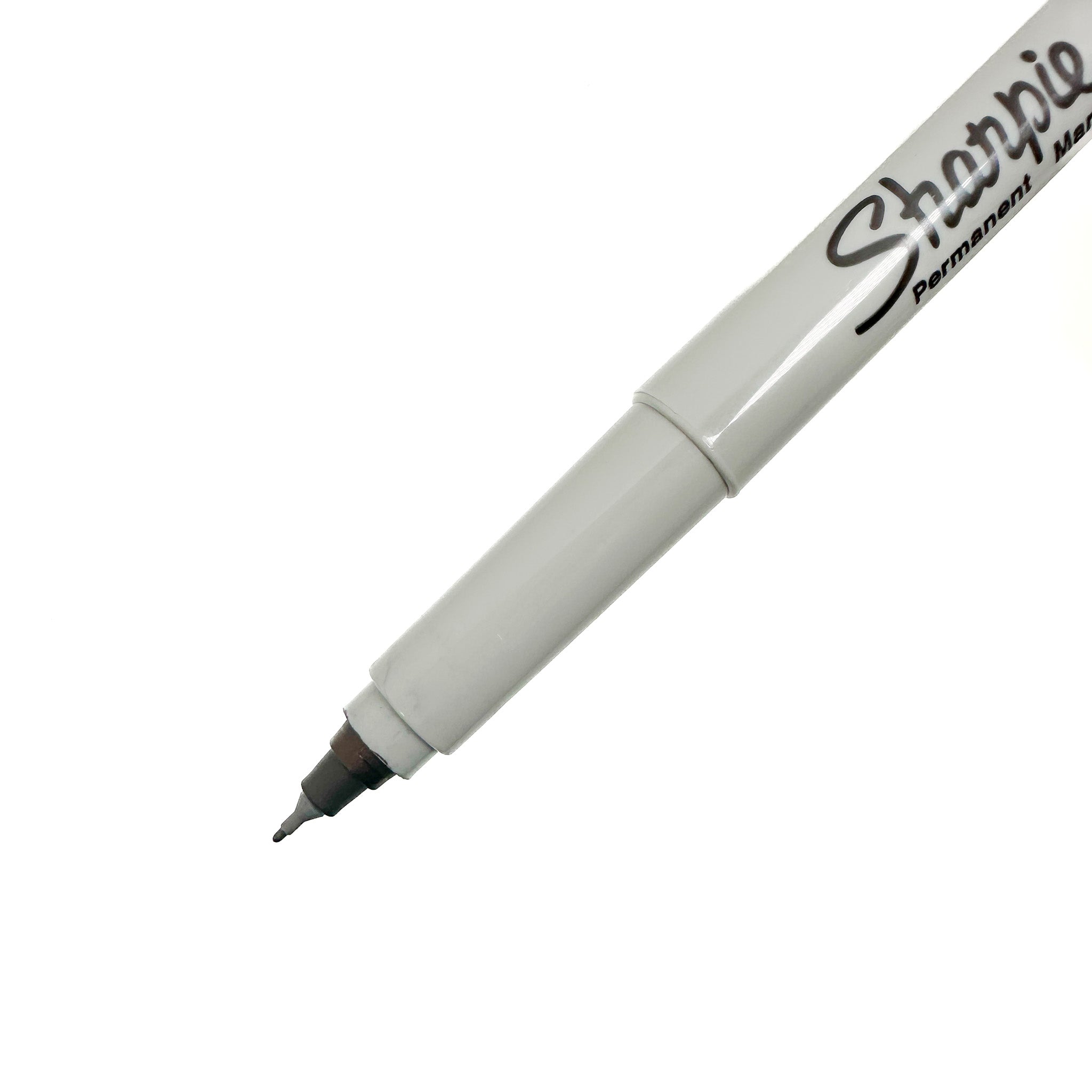 Close-up of the Sharpie Ultra Fine Point Permanent Marker tip, illustrating its ultra-fine point for detailed work on various surfaces.