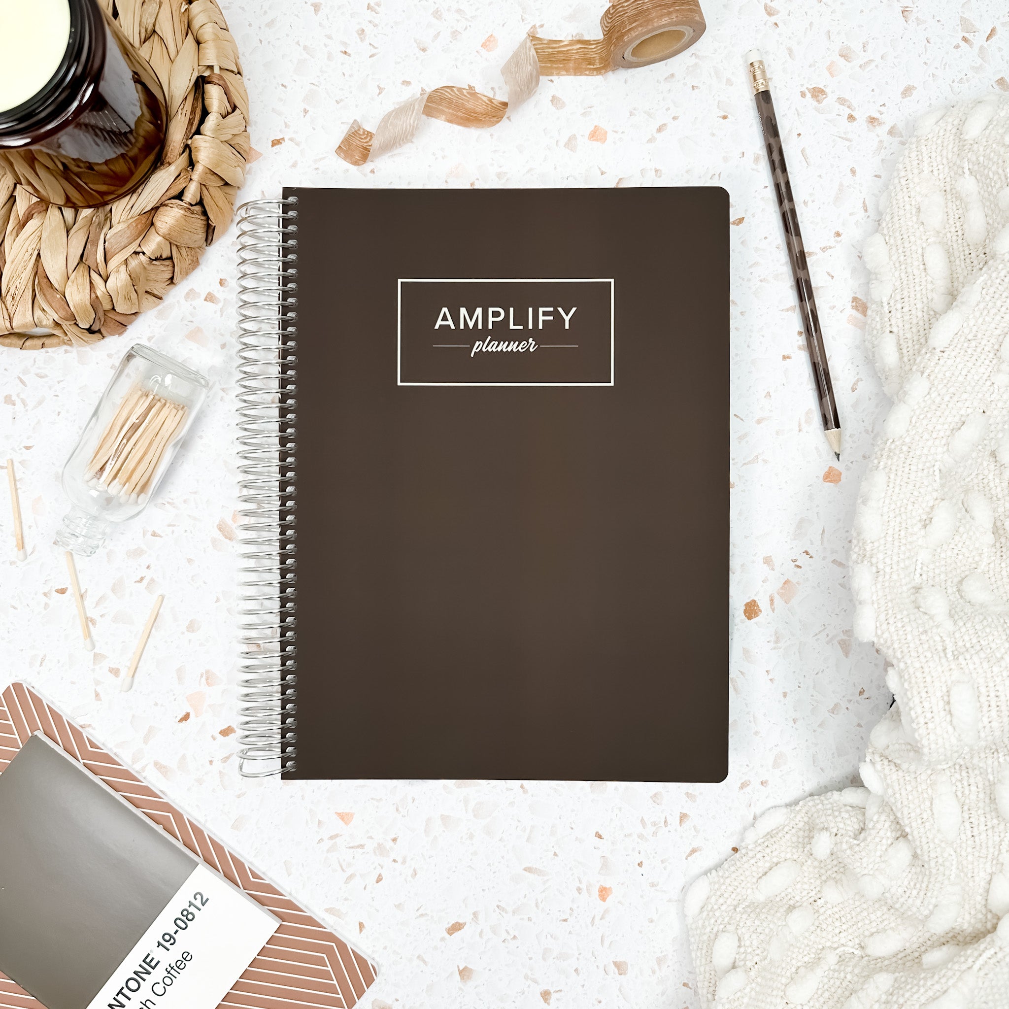 Next Step Brown weekly amplify planner on styled background