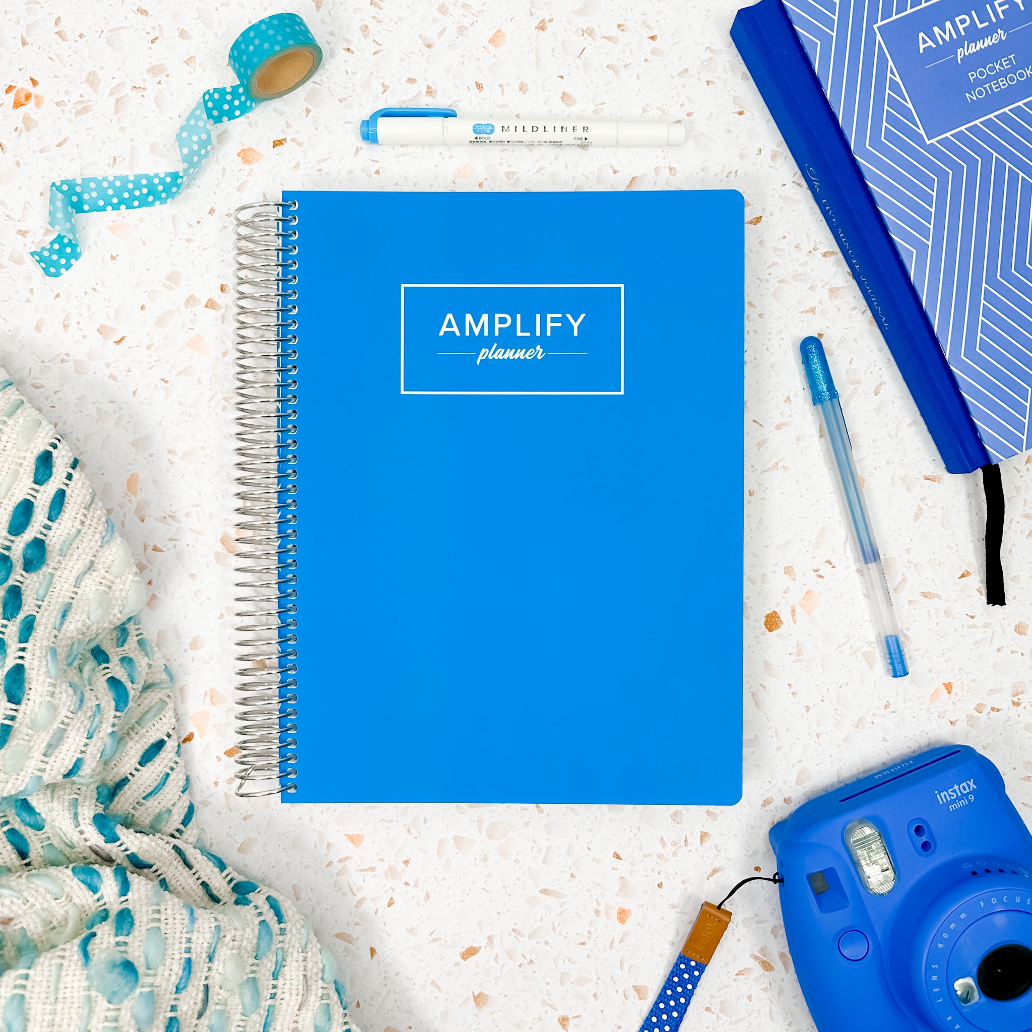 Blue Possibility weekly amplify planner on styled background