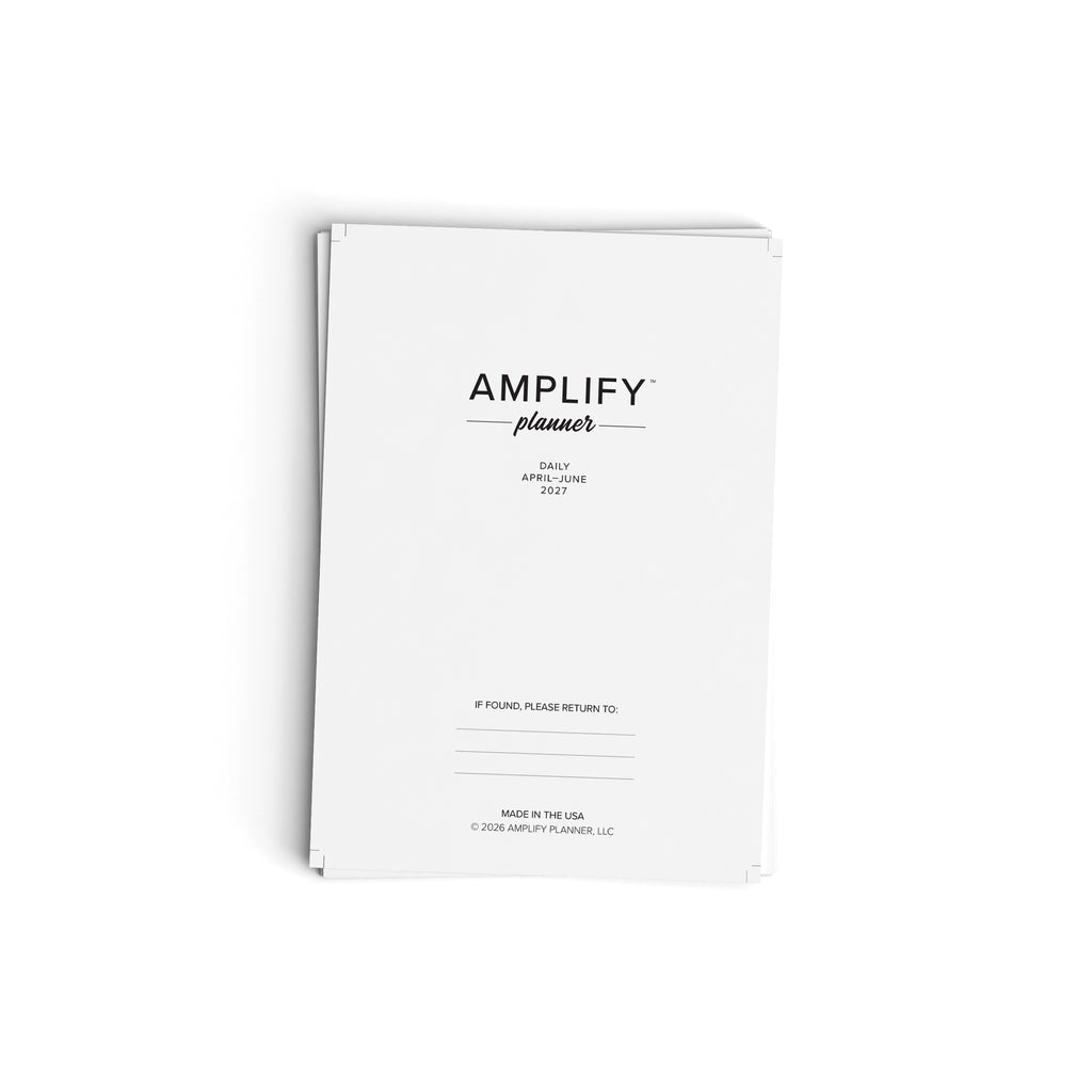 A white Amplify Planner booklet for the spring/summer 2027 semester, photographed from a high angle on a clean white background.