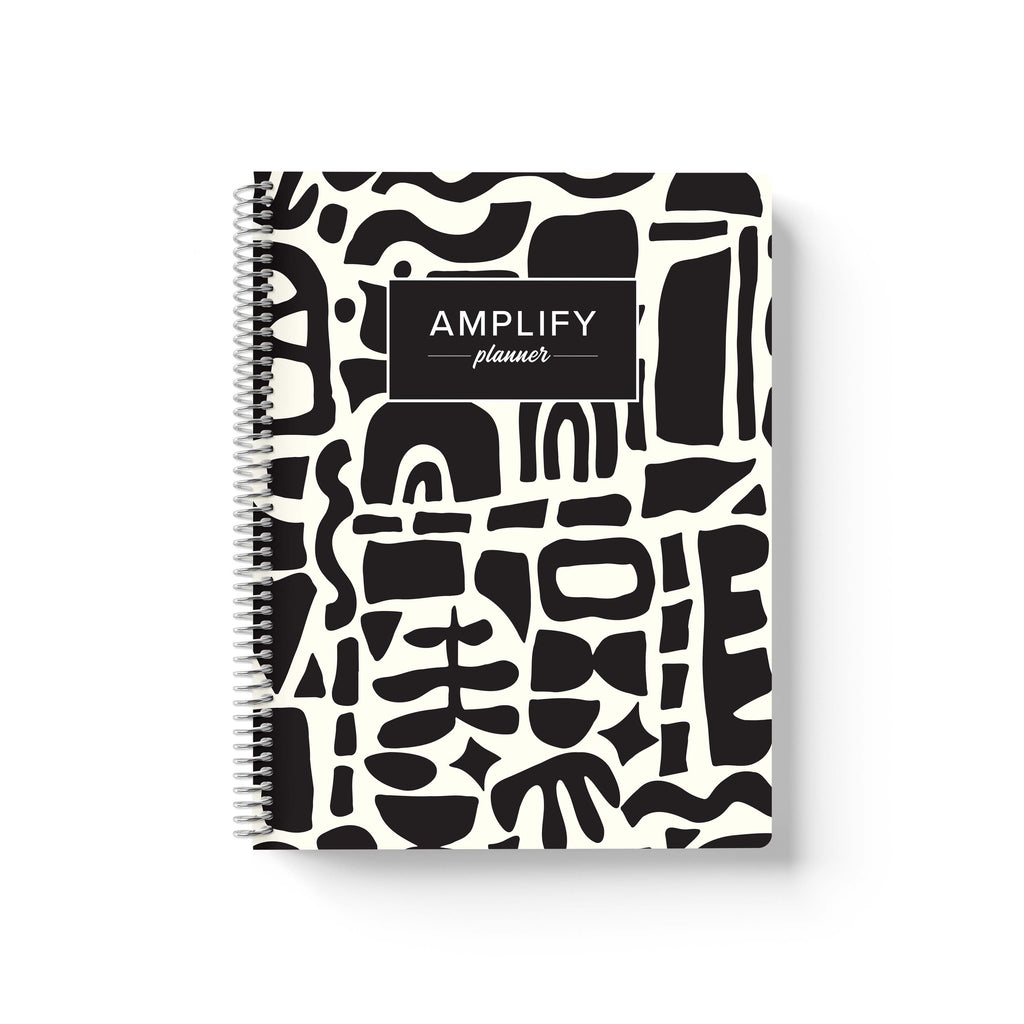 abstract collage cover of undated daily Amplify Planner  on a white background