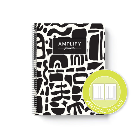 abstract collage cover with graphic indicating vertical weekly layout option in undated daily Amplify Planner