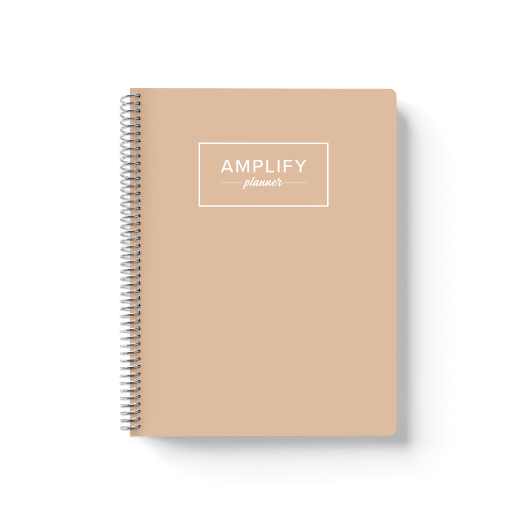 golden light weekly Amplify Planner july 2025-june 2026 Weekly Planner on a white background.