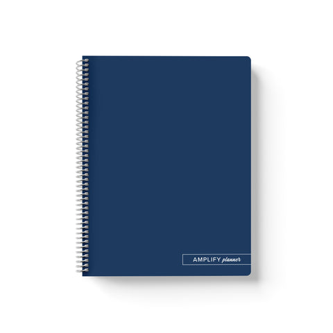 Midnight Pages Amplify Planner Spiral Notebook on a white background. 