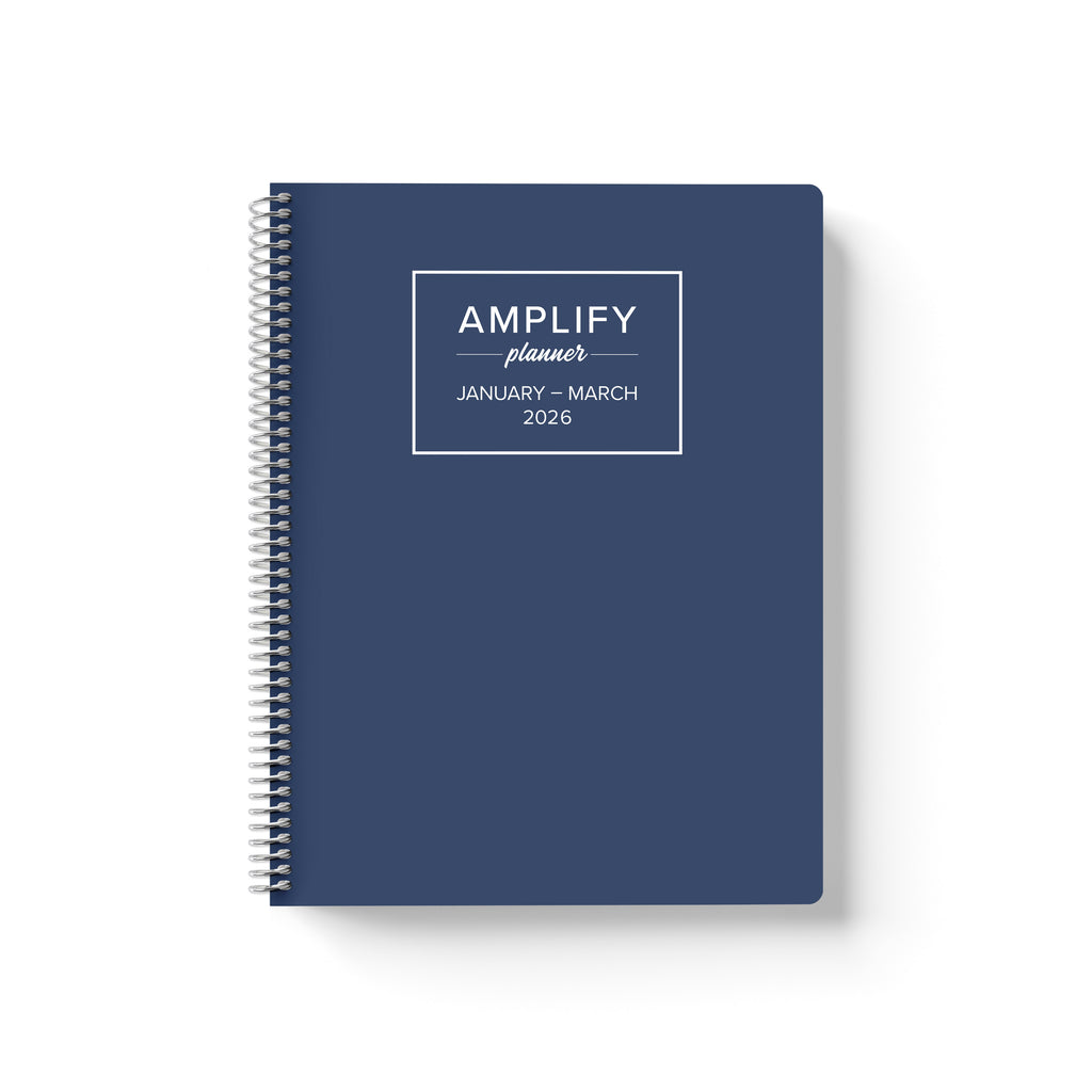 Daily Planner - January-March 2026 - Night Into Navy cover featuring the Amplify Planner logo and a sleek navy blue design.