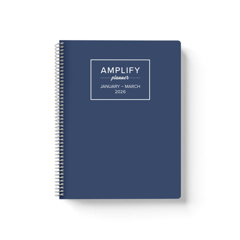 Daily Planner - January-March 2026 - Night Into Navy cover featuring the Amplify Planner logo and a sleek navy blue design.